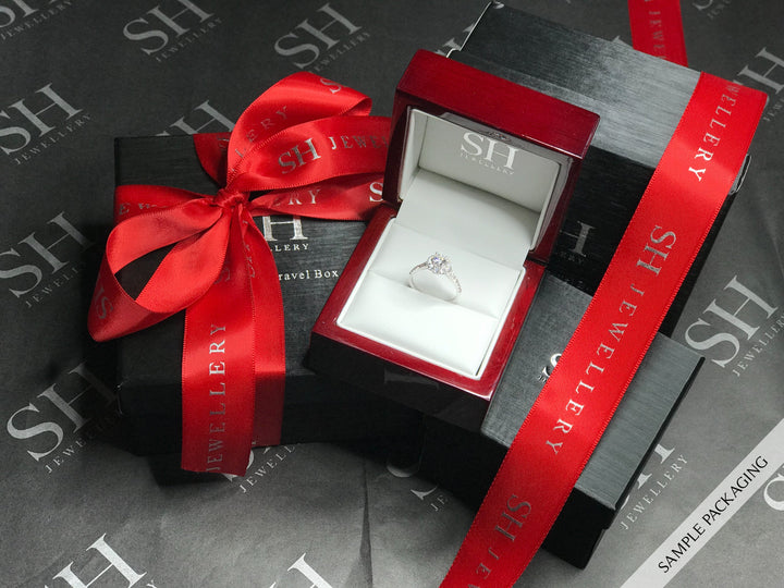 Pictured with sample packaging with ring box and ribbons|thumb_group:3