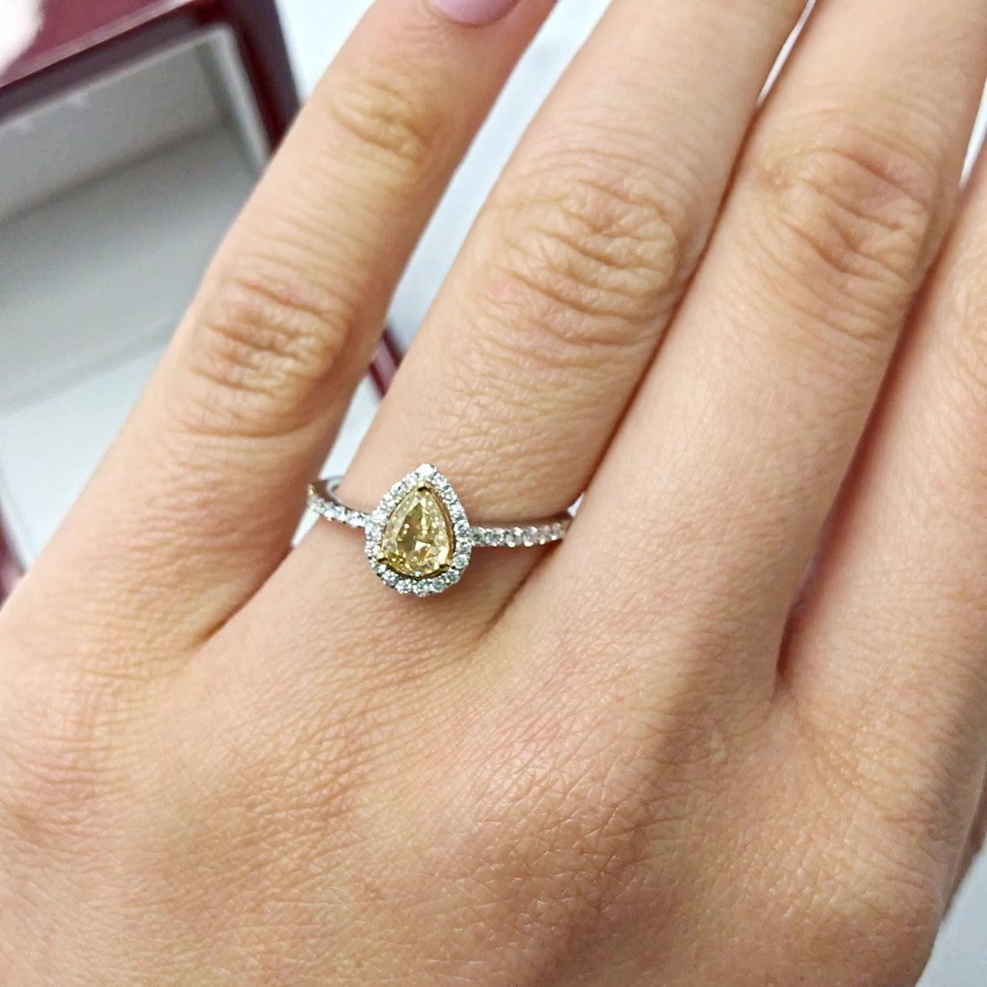Pear-Shaped Yellow Diamond Halo design