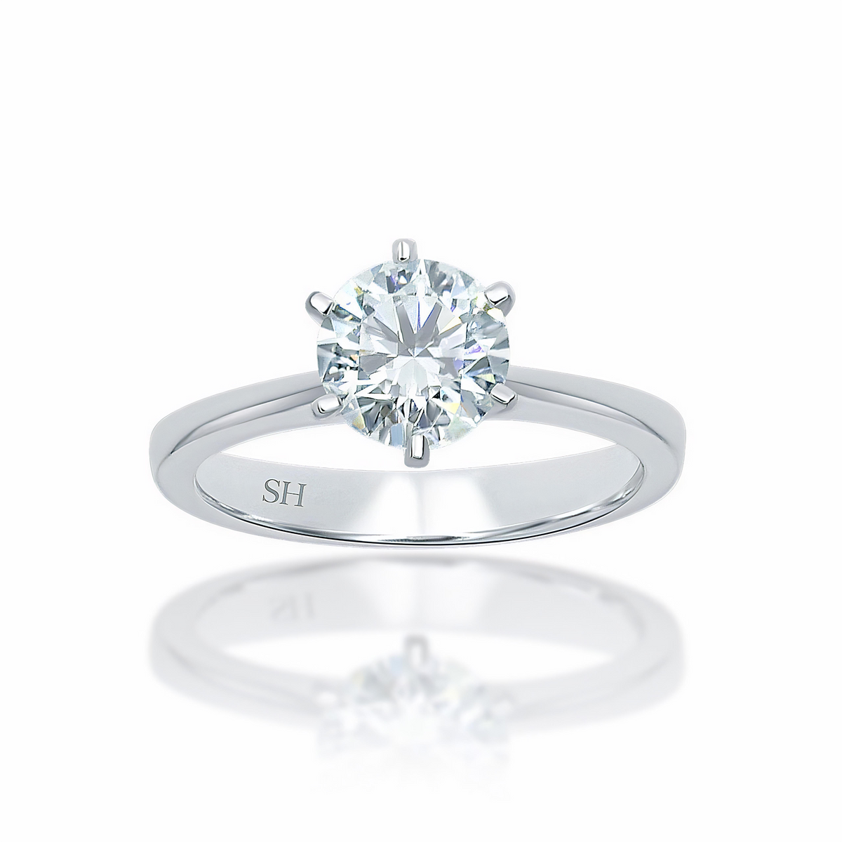 Pictured with 1.28ct diamond|thumb_caption:1.30 carat|thumb_group:1