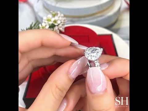 Bold Pear Shaped Halo & Pavé Set Diamond Band - W0578