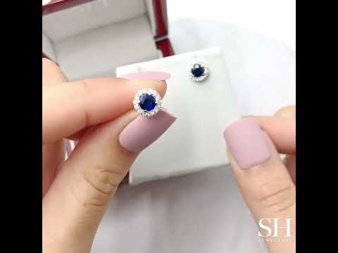 Pretty royal blue sapphire and diamond halo studs - W0310