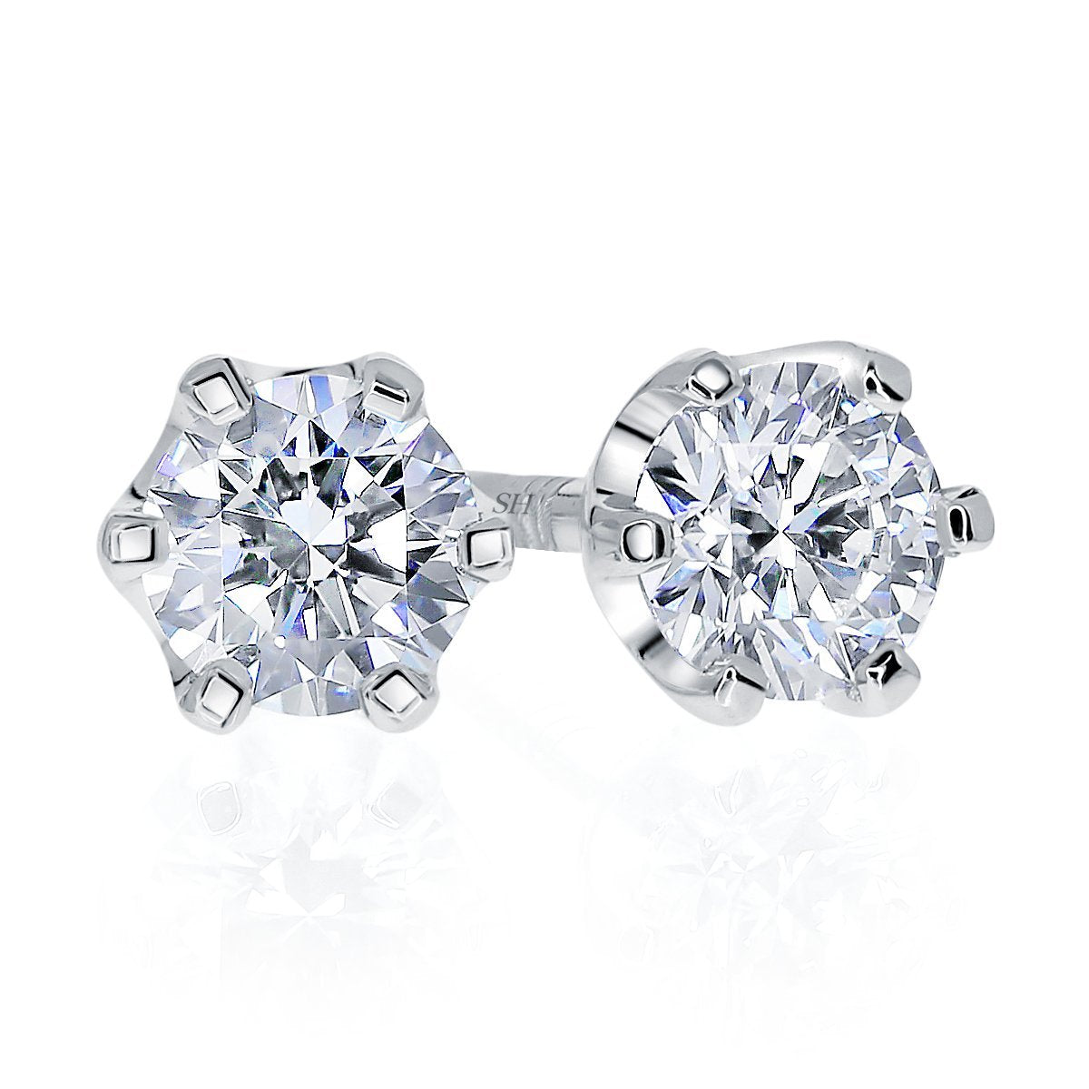 Pictured with 0.64ct diamond|thumb_caption:0.64ct TW centre diamonds (0.32ct each)|thumb_group:1