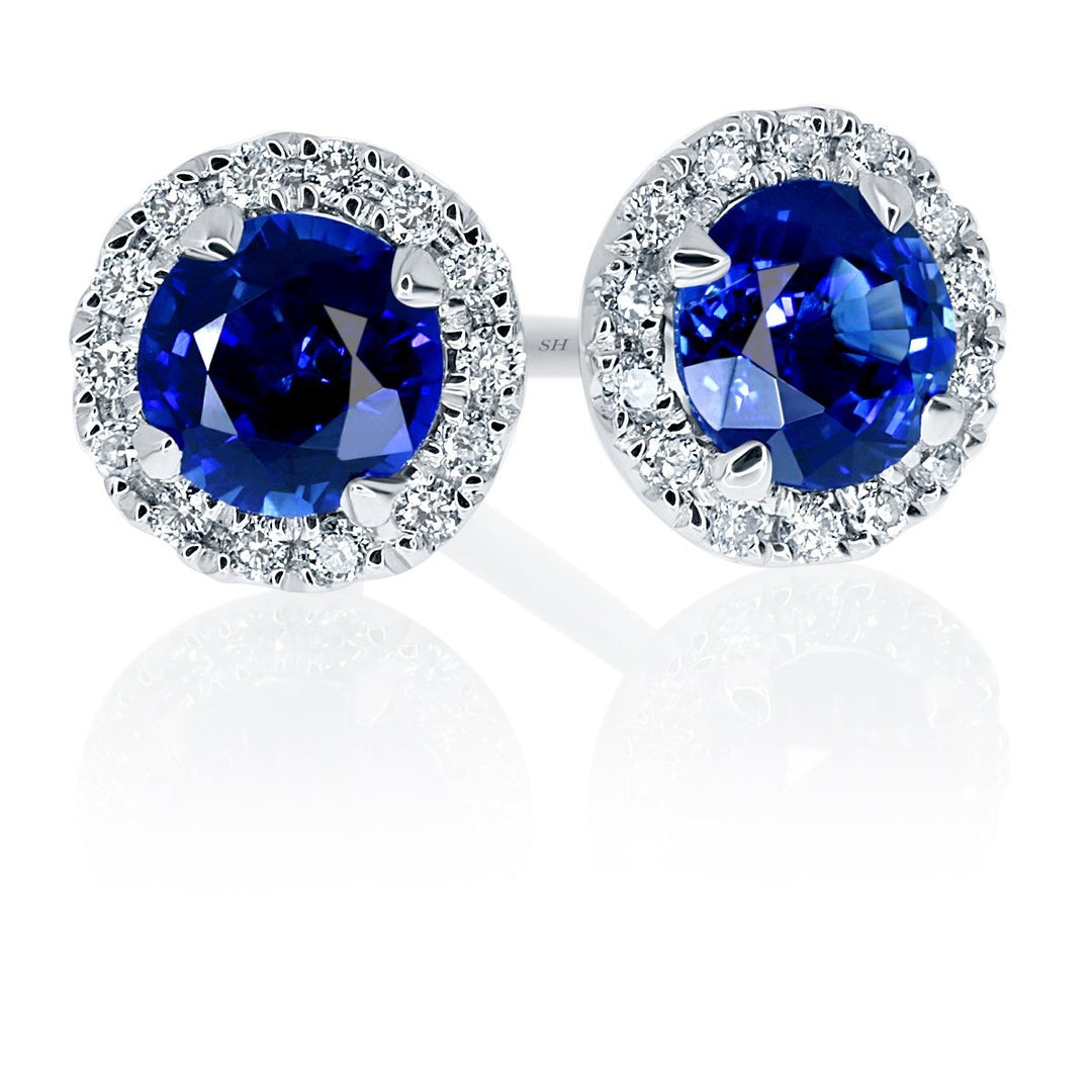 Pretty royal blue sapphire and diamond halo studs - W0310