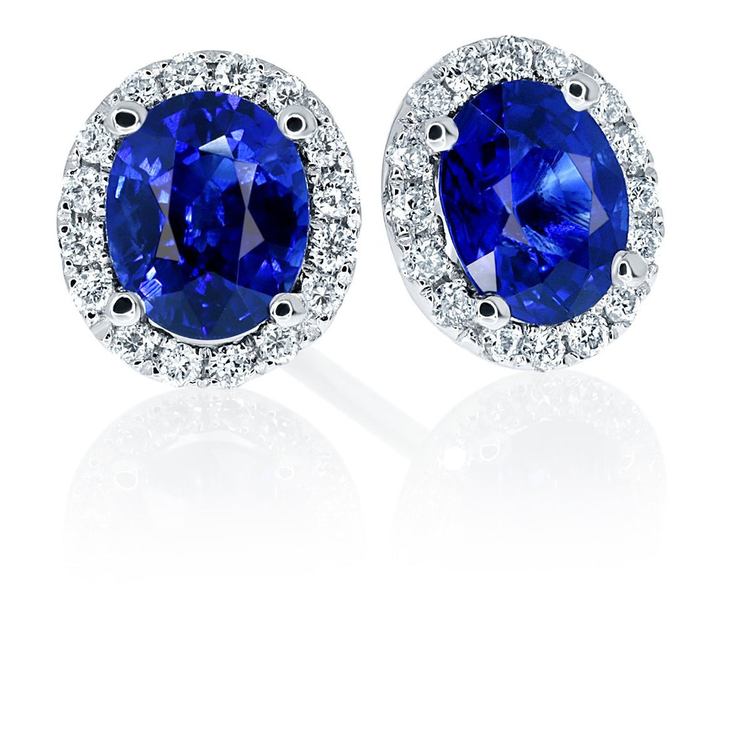 Glamorous oval royal blue sapphire and diamond halo studs - W0311