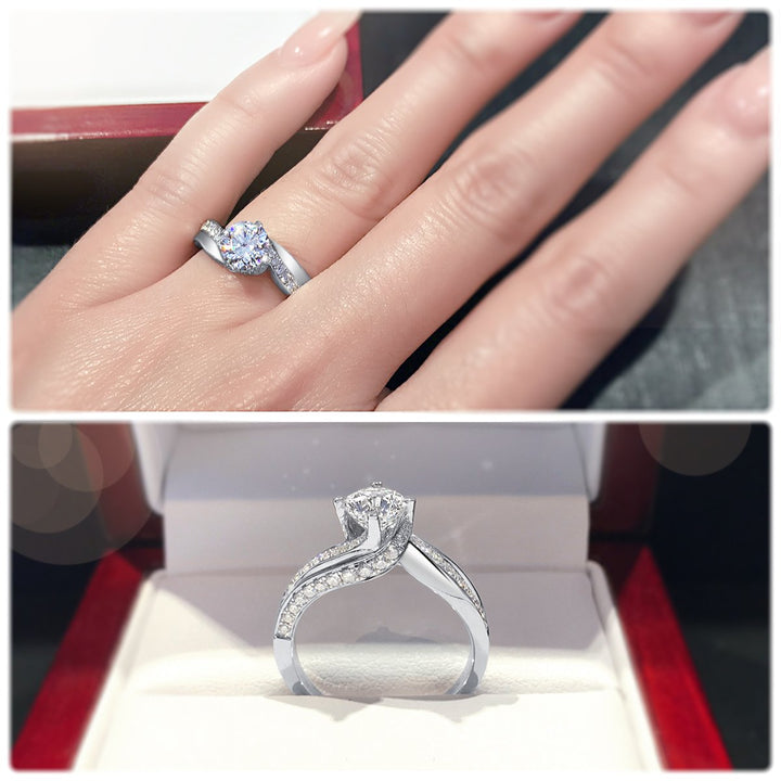Four claw twist with polished band and sweeping diamonds - W0331