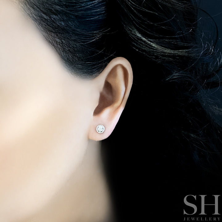 Pictured with 0.36ct diamond|thumb_caption:0.36ct TW centre diamonds (0.18ct each)|thumb_group:3