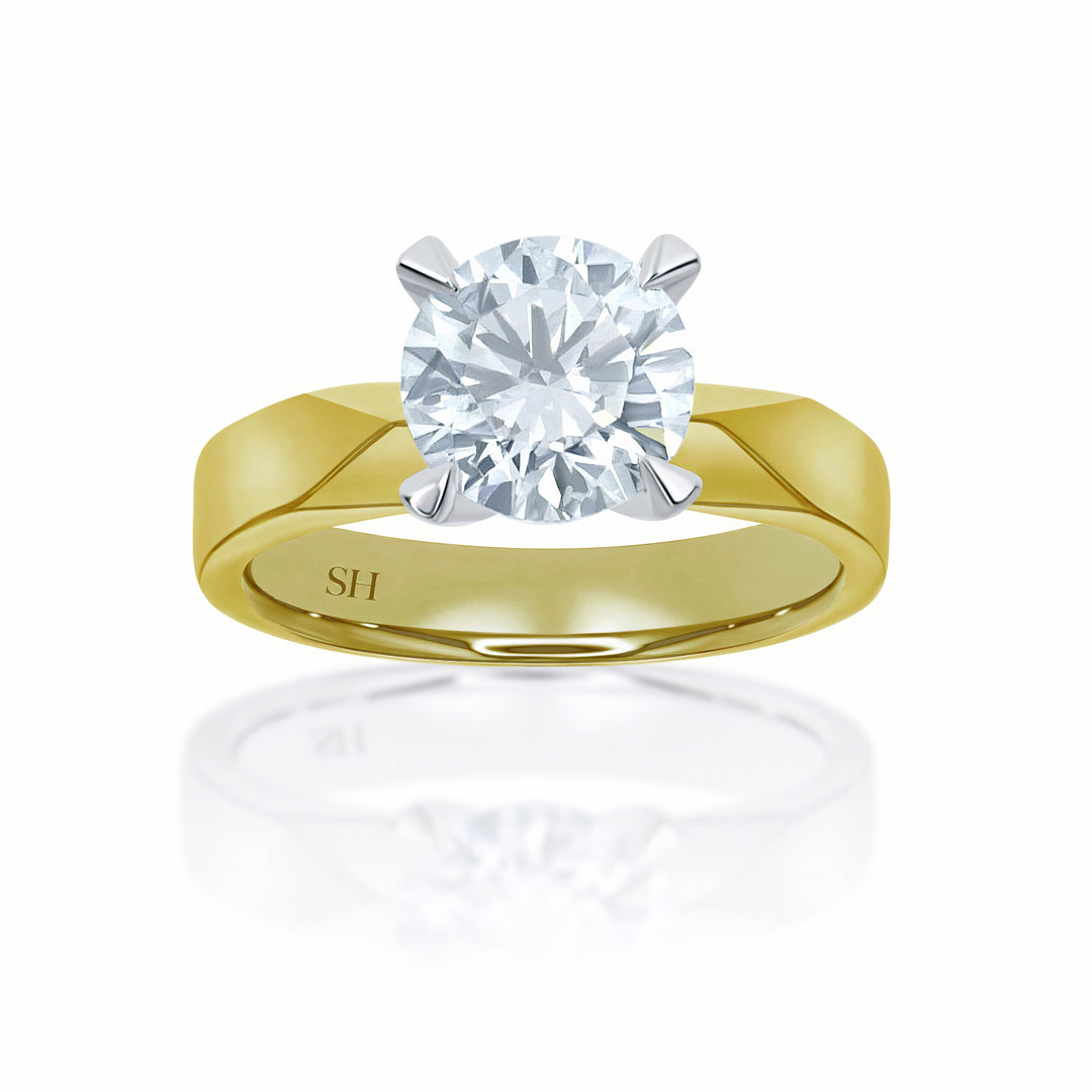 Pictured with 2.02ct diamond|thumb_caption:2.02 carat|grid_preview:true