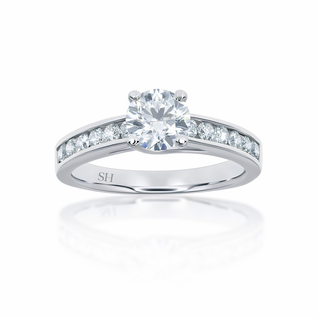 Modern 4-Claw engagement ring with channel set diamond band - W0022
