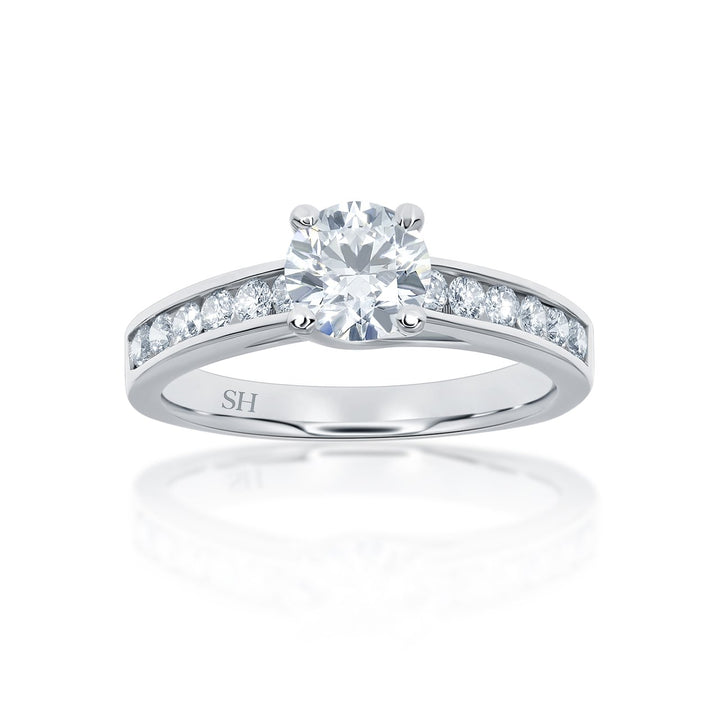 Modern 4-Claw engagement ring with channel set diamond band - W0022
