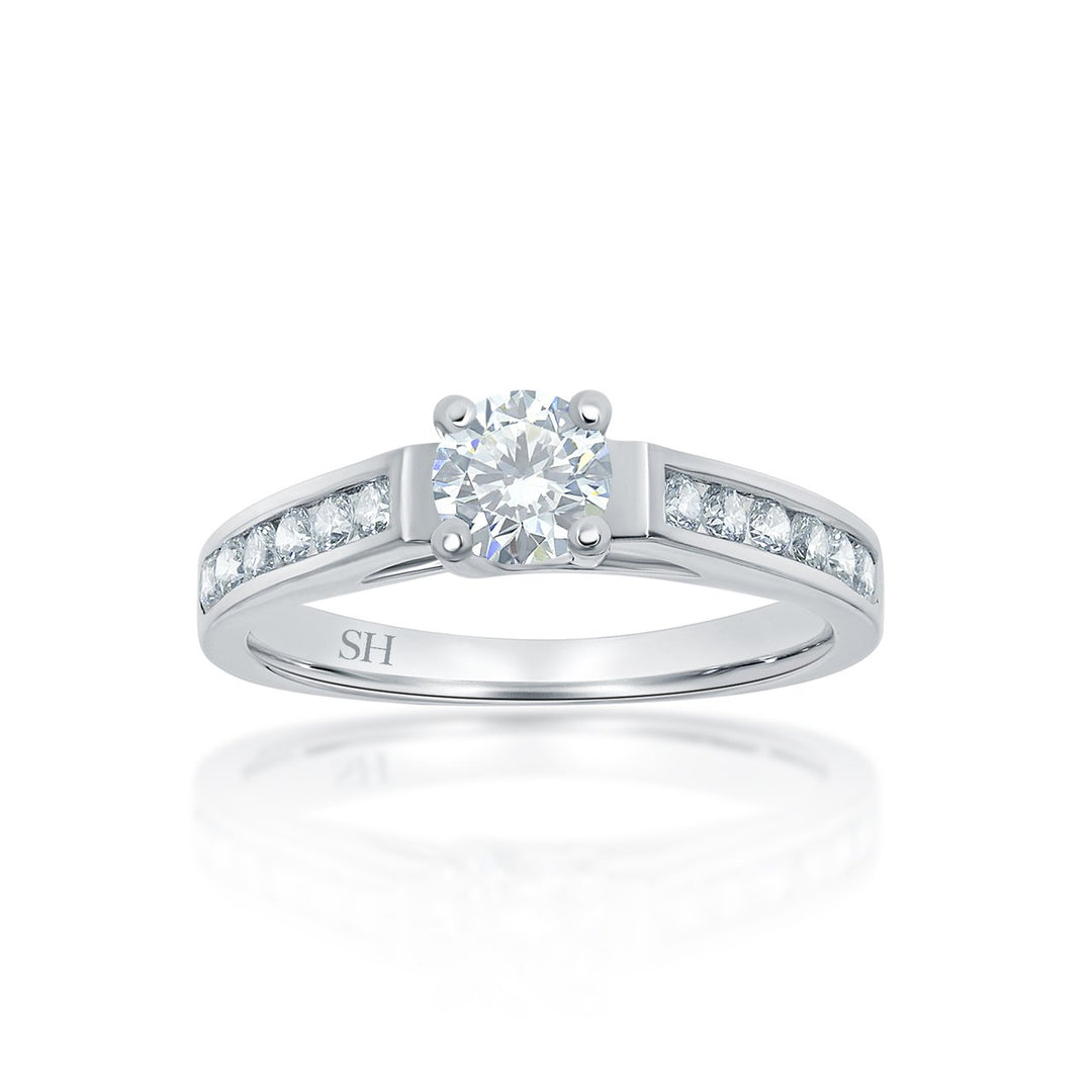 Modern 4-Claw engagement ring with channel set diamond band - W0022