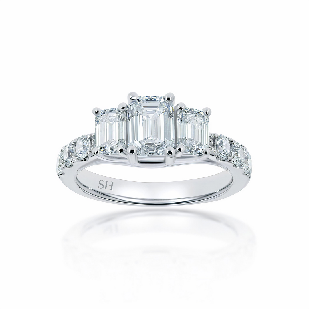 Trilogy Emerald Cut engagement ring with claw set band - W0034