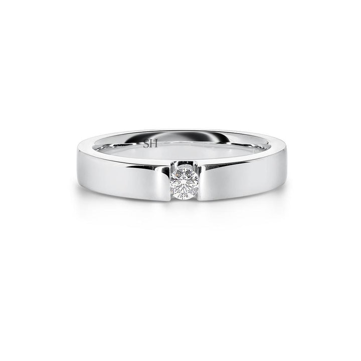 Modern wedding band with floating round brilliant cut diamond R10-3925A-W0063. A fine 18kt white gold ring featuring a floating glittering round brilliant cut diamond.