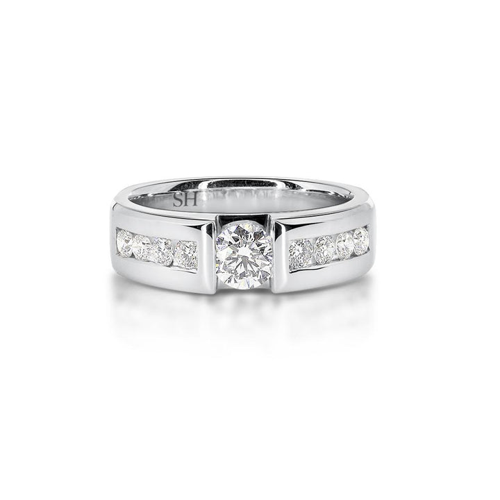 Wedding band with floating round diamond and channel set shoulders (6mm) - W0068