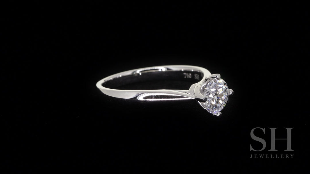 Brilliant solitaire with offset 4-claw design - W0400