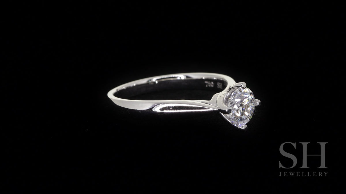 Brilliant solitaire with offset 4-claw design - W0400