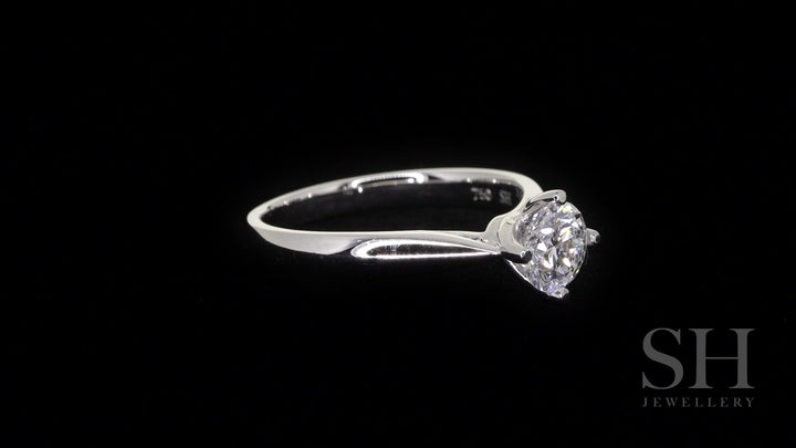 Brilliant solitaire with offset 4-claw design - W0400