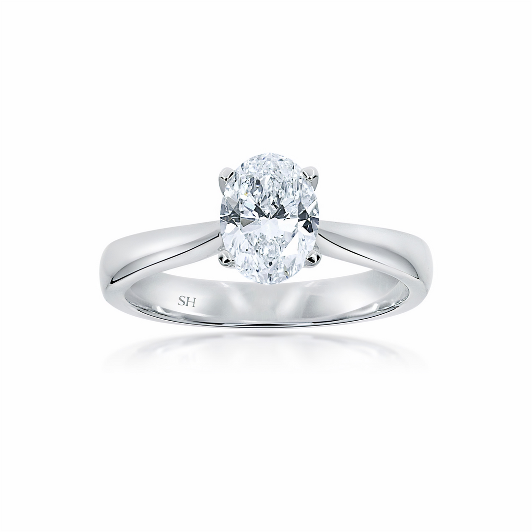 Minimalistic 4-claw Oval solitaire with tapered band - W0408