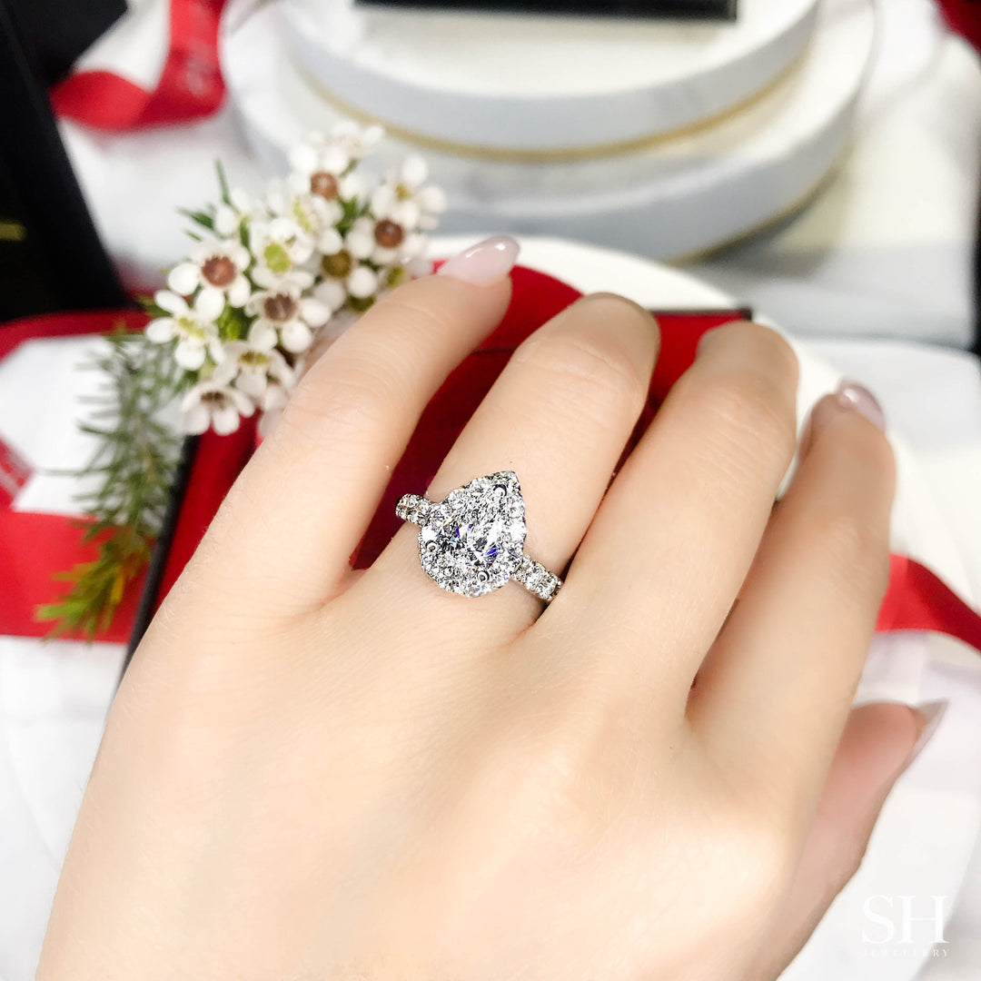 Bold Pear Shaped Halo & Pavé Set Diamond Band - W0578