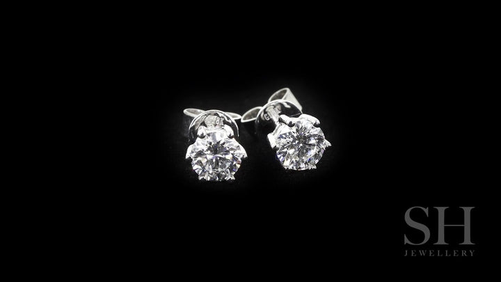 video:WppJ4DCsIUg|video360:true|caption:Shown with 1.21ct diamond.|option:Carats=1.2 carat|thumb_caption:1.21ct TW centre diamonds (0.605ct each)|thumb_group:3