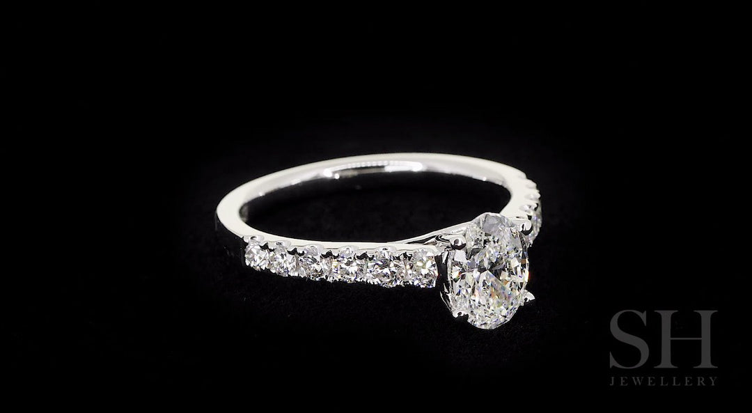 Timeless 4-claw Oval diamond ring with pave set band - W0407