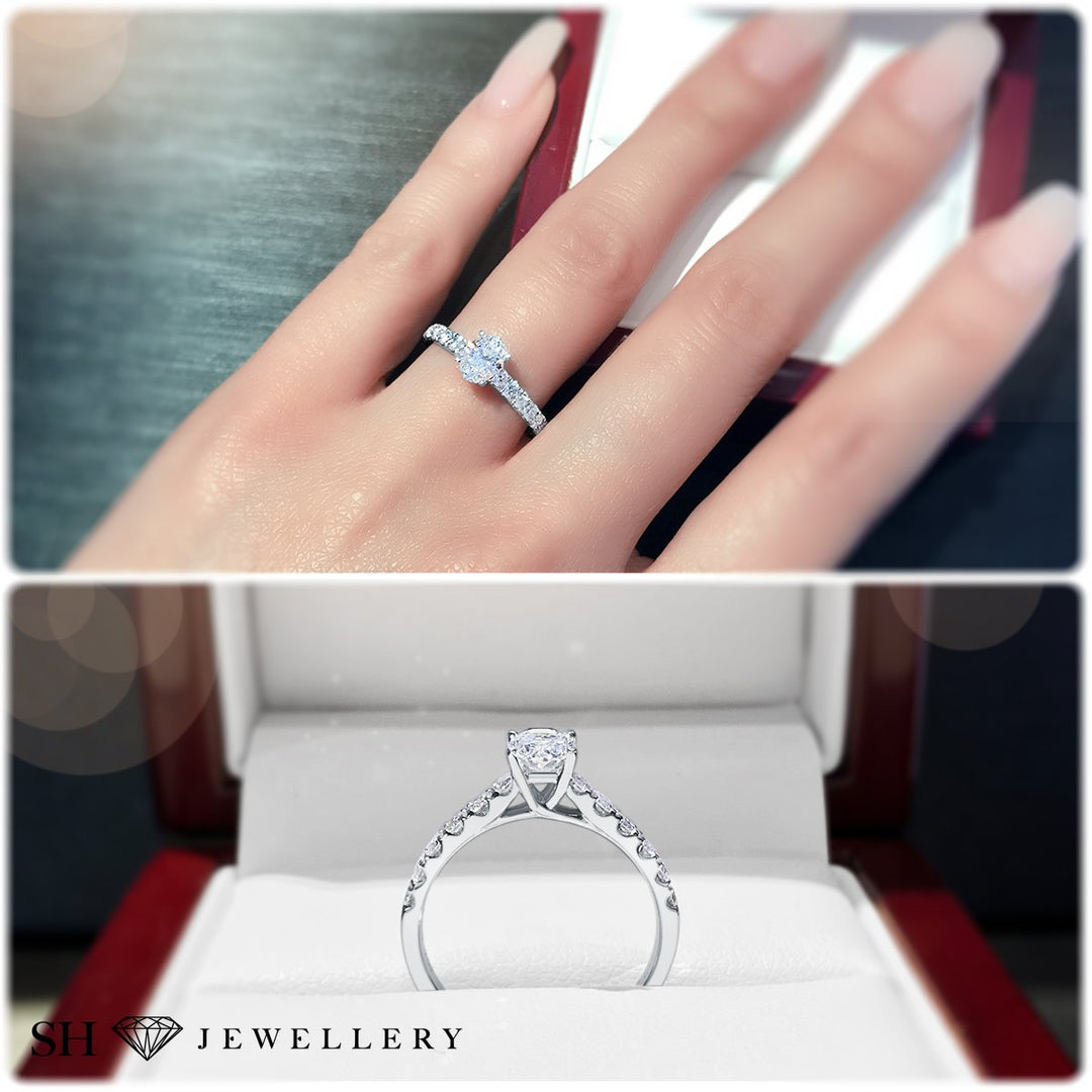 Timeless 4-claw Oval diamond ring with pave set band - W0407